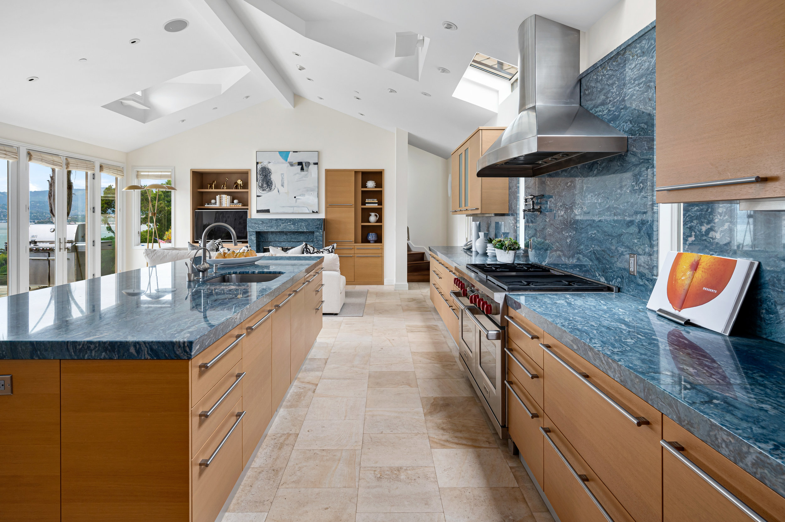 An open floor plan view of the kitchen and adjoining living area