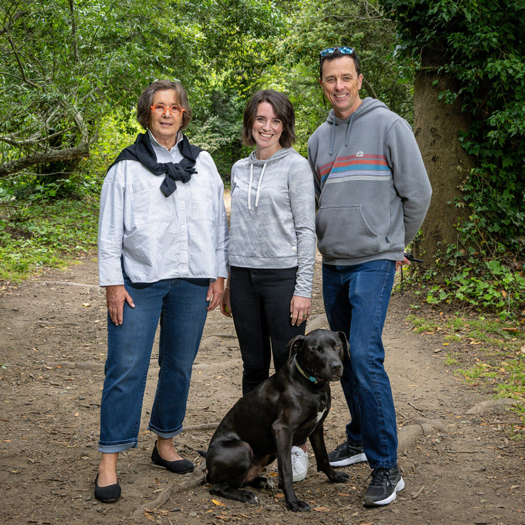 Group photo of San Francisco agents, Analise Electra Smith-Hinkley, Laura Taylor, and Mike Murphey of Generation Real Estate standing amid trees