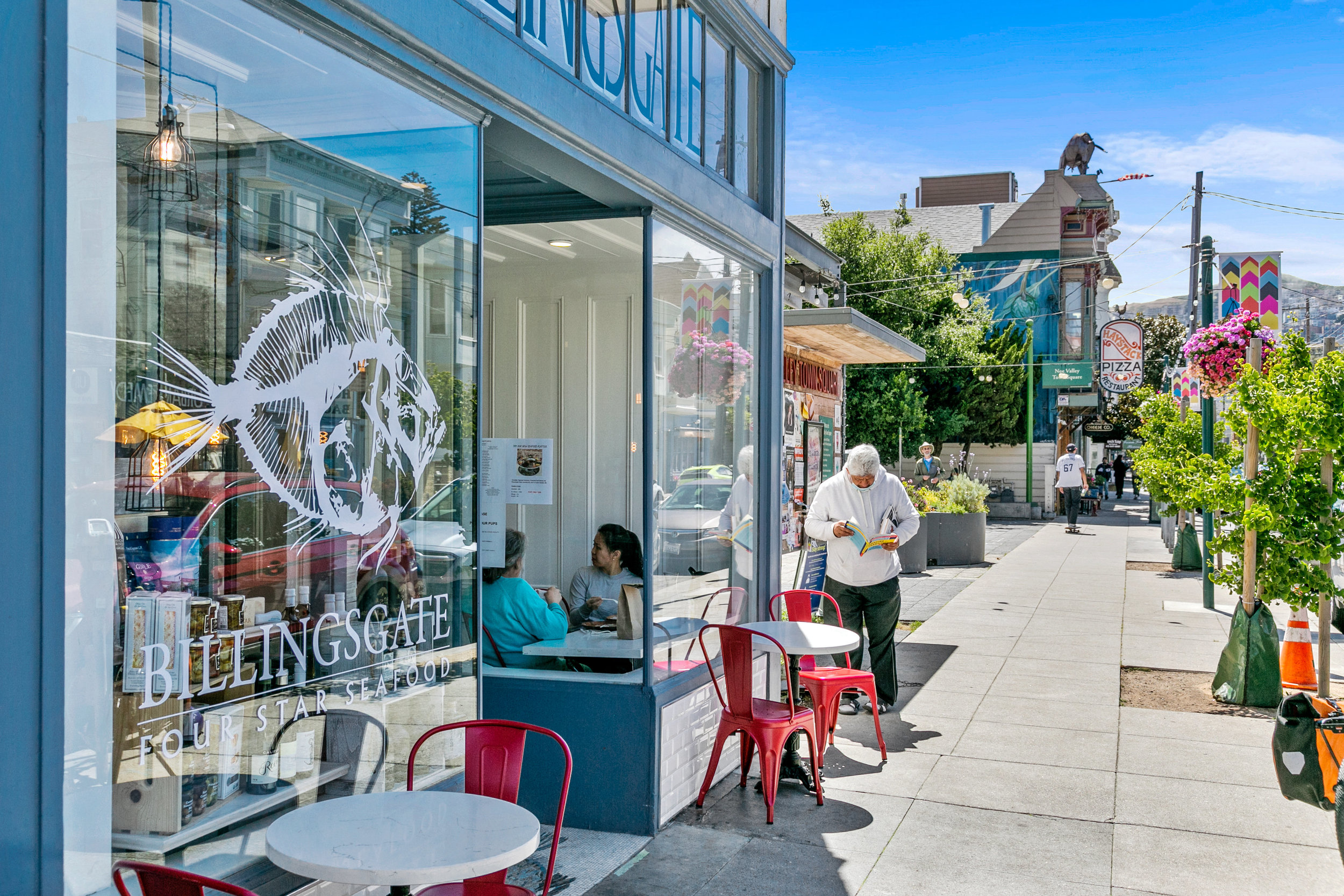Street view of Noe Valley in San Francisco, showing the exterior of Billinsgate restaurant 